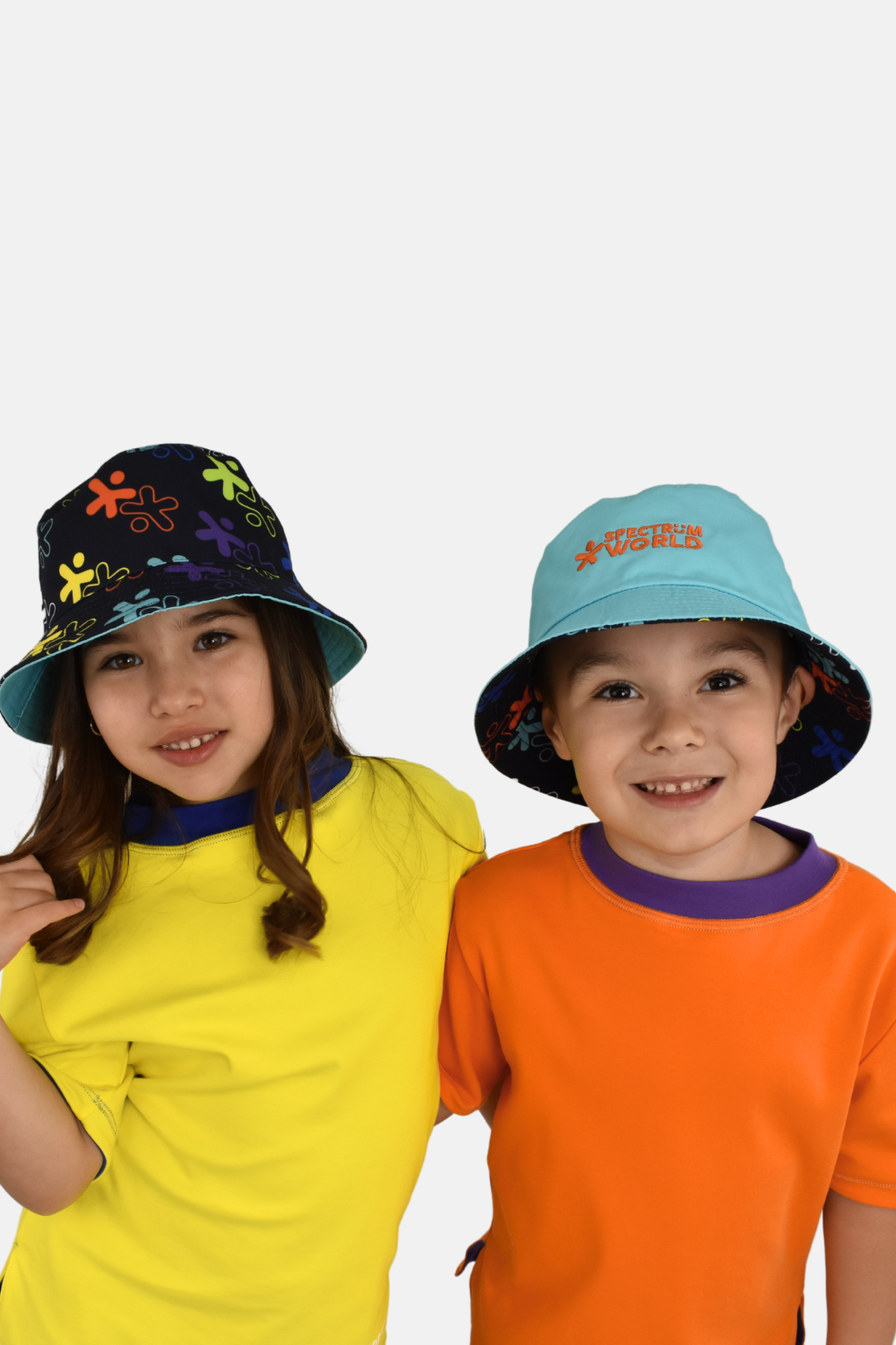 kid wearing reversible sensory-friendly bucket hat with flat seams. Comfort for everyone.