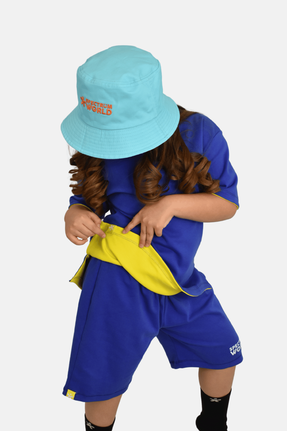 child wearing reversible sensory-friendly sunrise tee with soft seams and tagless design