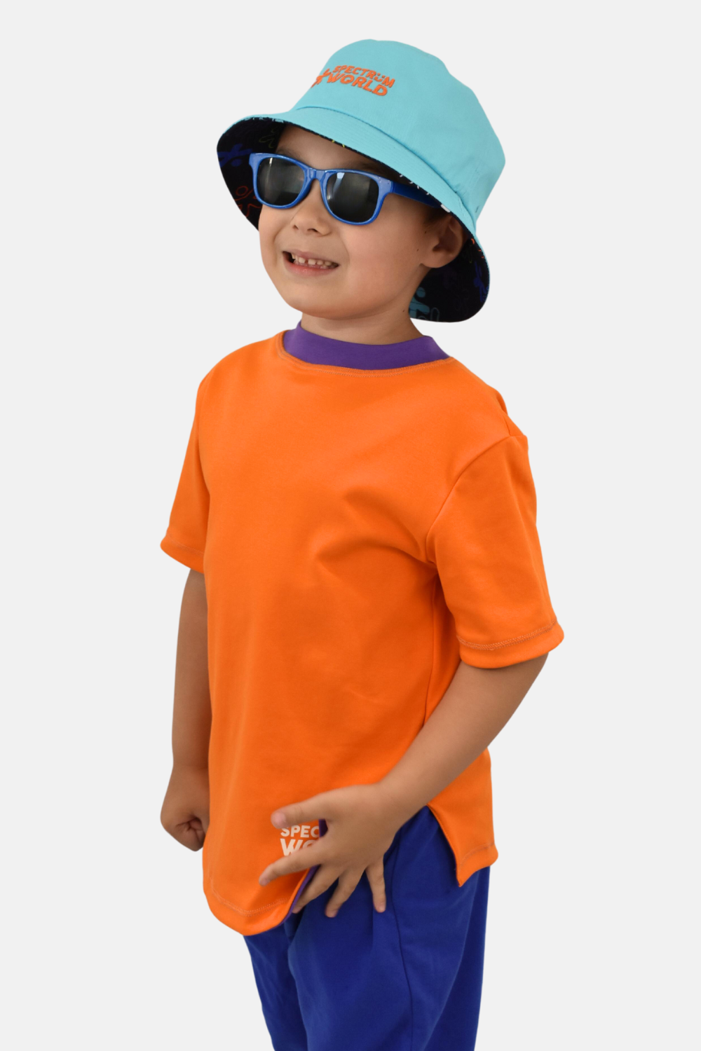 child wearing reversible sensory-friendly sunrise tee with soft seams and tagless.
